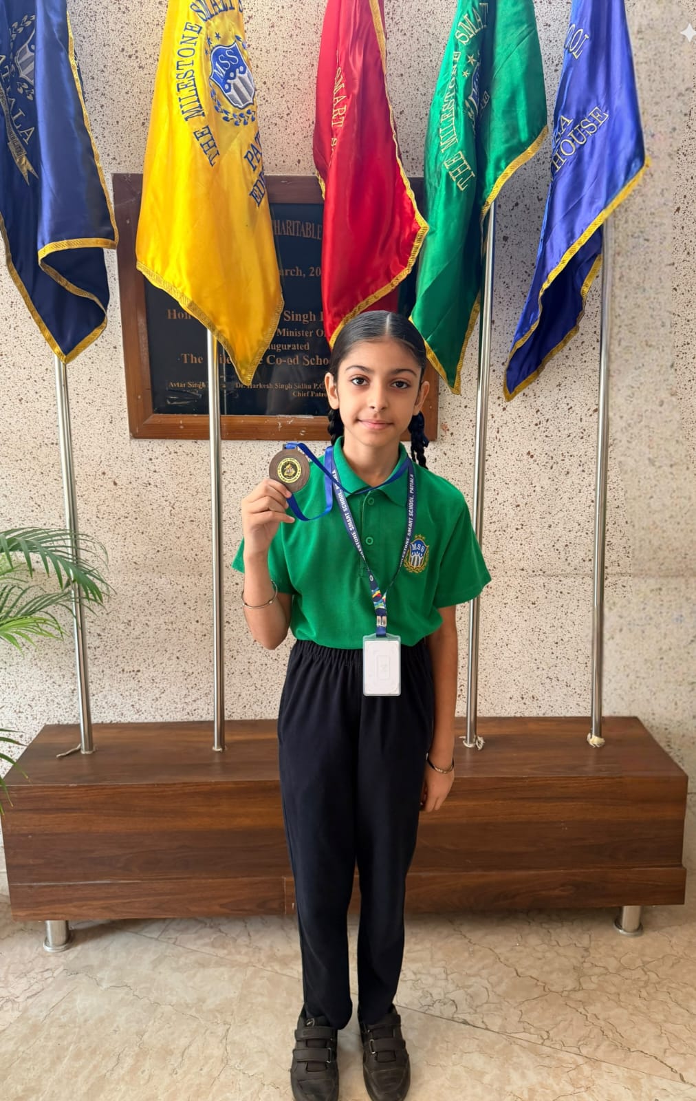 Savreen Kaur of Grade V winning the Bronze Medal in the Under-14 Singles Badminton Tournament