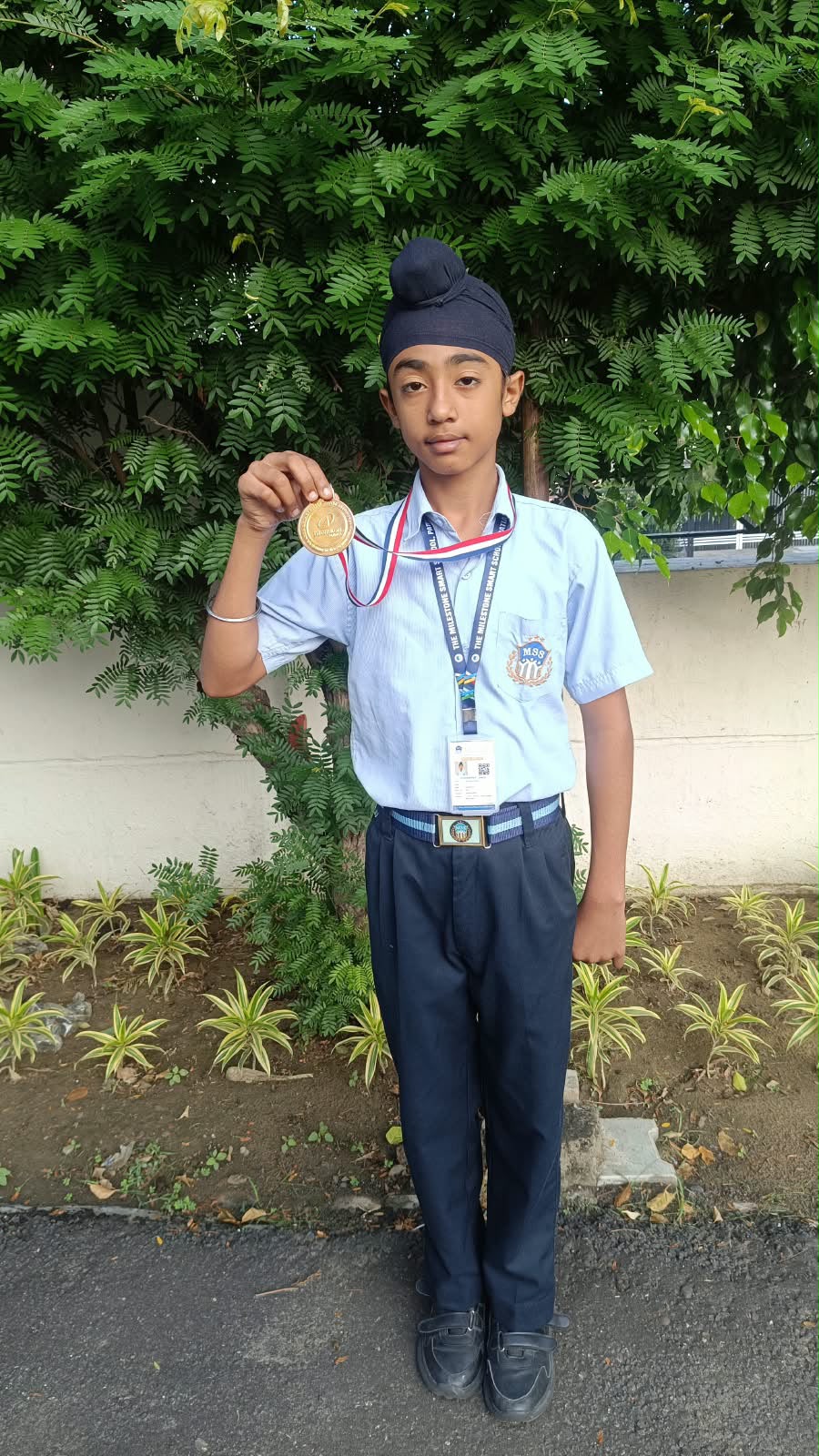 Jashanpreet Singh celebrating his Roller Hockey gold medal achievement